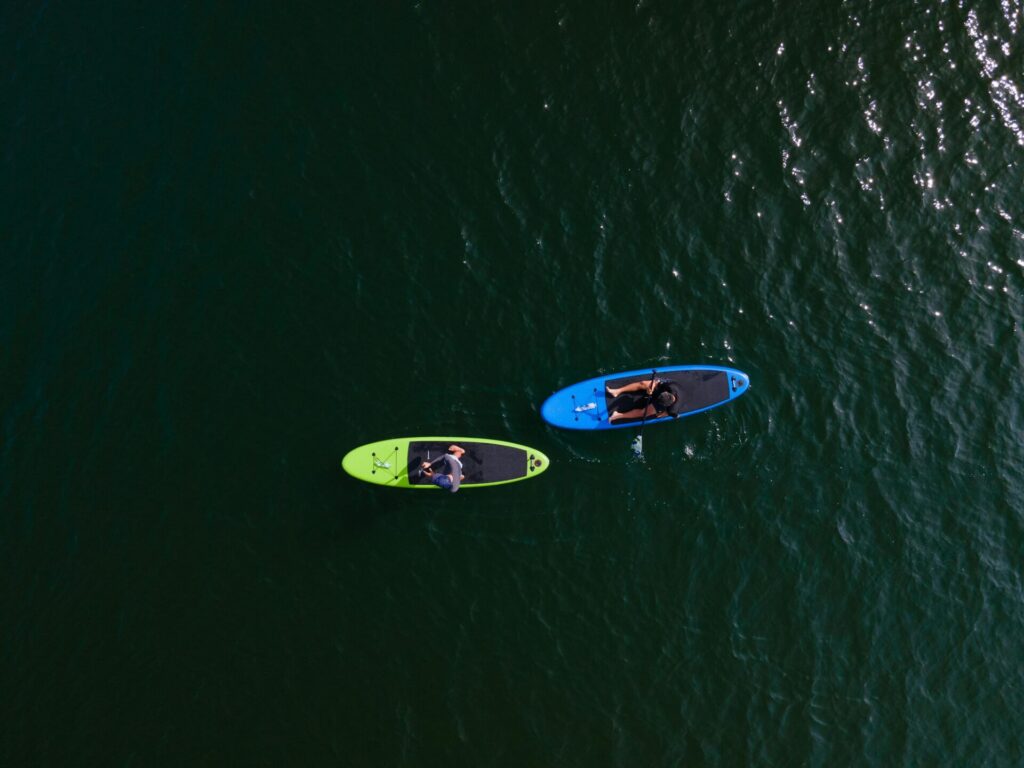 Kayaking and paddleboarding in calm coastal waters in Gulf Shores
