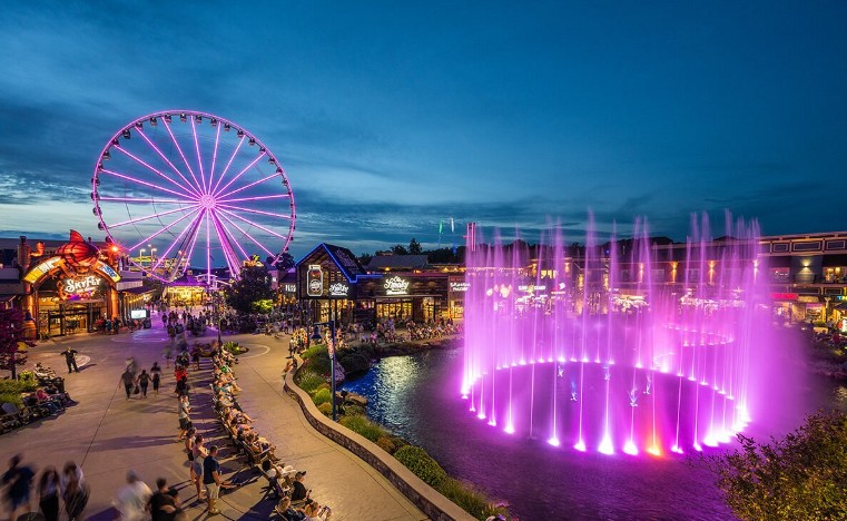 The Island in Pigeon Forge with ferris wheel and shops at sunset