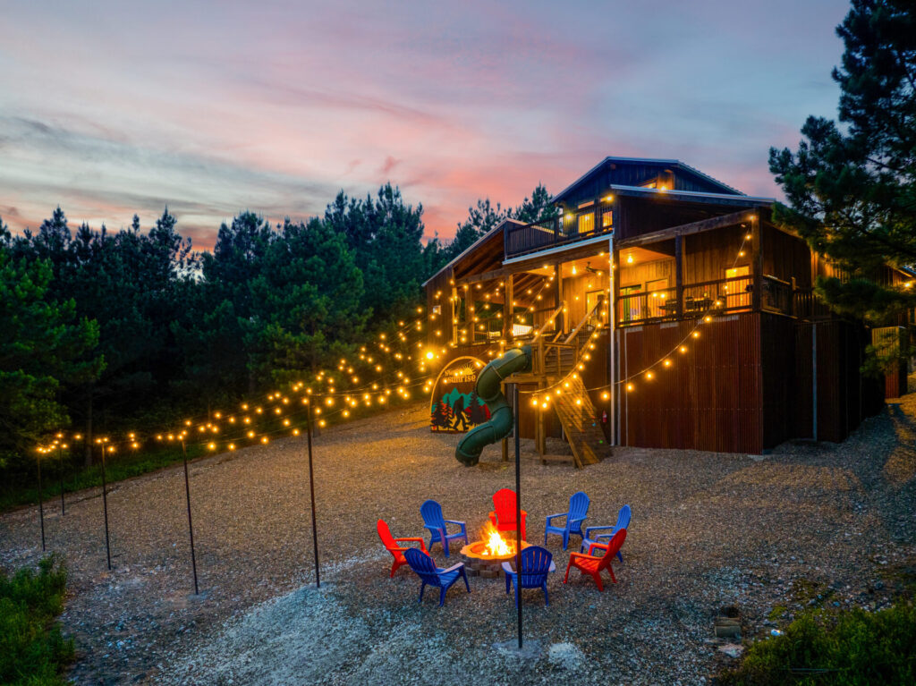 sweet-sunrise-broken-bow-cabin-with-firepit-and-slide-at-sunset.jpg