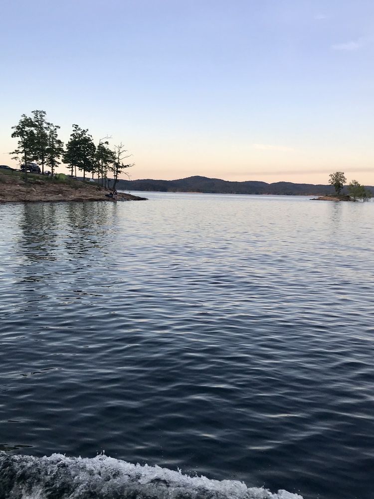 Sunset over Broken Bow Lake in Broken Bow, Oklahoma.