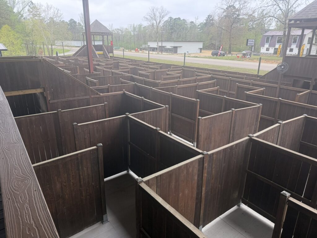 Wooden outdoor maze at Hochatown Trail Rides & Maze in Broken Bow, Oklahoma.