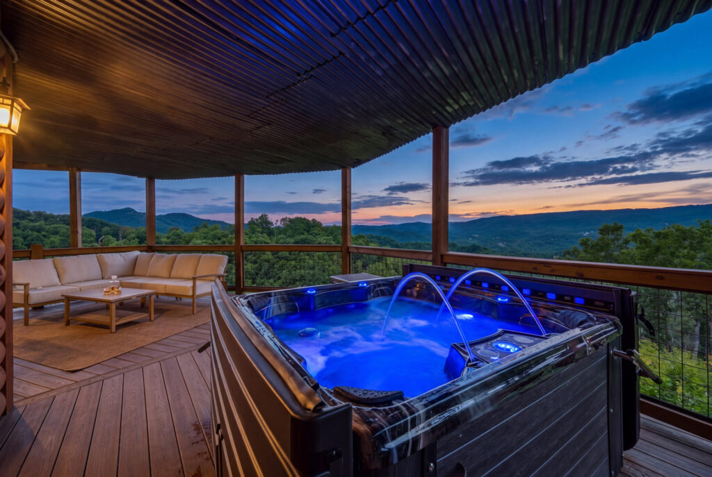 Hot tub at Bear Ridge Escape overlooking the Smoky Mountains at twilight