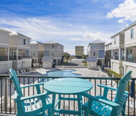 10-gulf-shores-beach-house-balcony-overlooking-pool-outdoor-dining.jpg