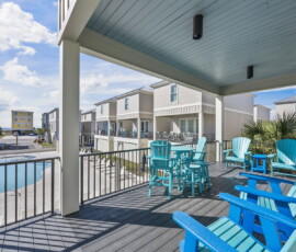 11-gulf-shores-beach-house-covered-balcony-seating-pool-view.jpg