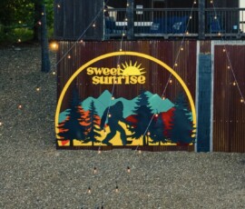 sweet-sunrise-broken-bow-cabin-sign-and-string-lights.jpg