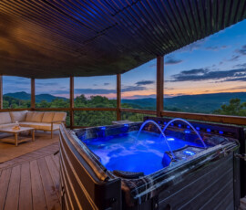 Hot tub at Bear Ridge Escape overlooking the Smoky Mountains at twilight