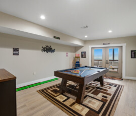 Spacious game room with pool table at Bear Ridge Escape