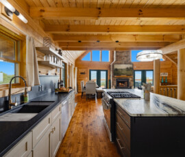 Spacious kitchen and dining area for group meals at Bear Ridge Escape
