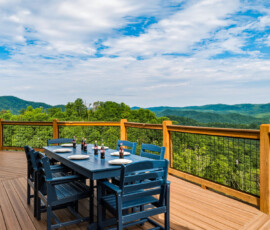 Outdoor dining area with sweeping Smoky Mountain views